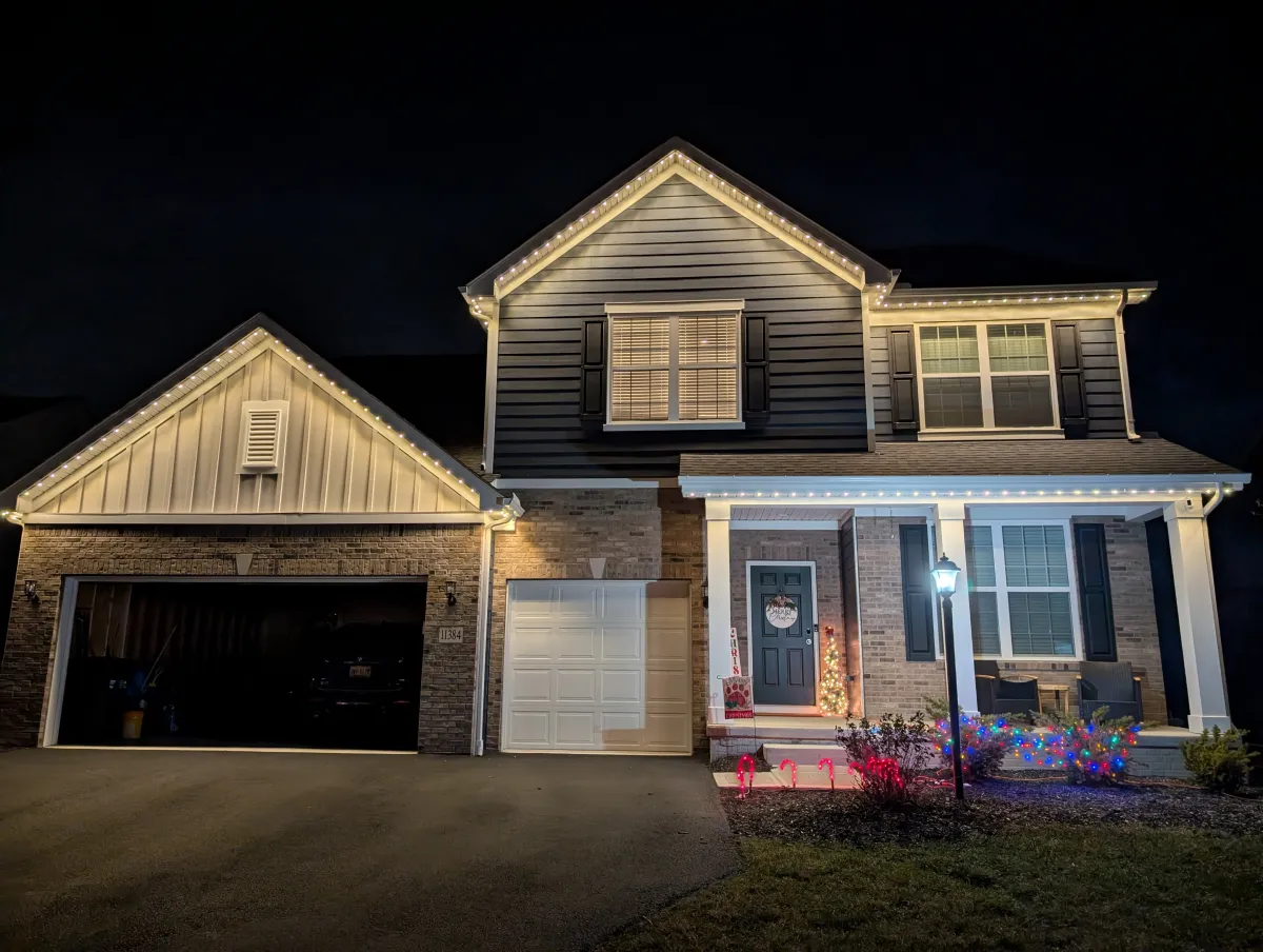 Warm white lights brick home