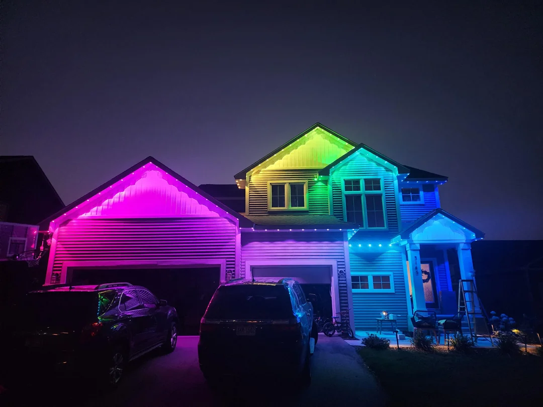 Freshly installed Govee permanent outdoor lights showing RGBIC color segments along a roofline