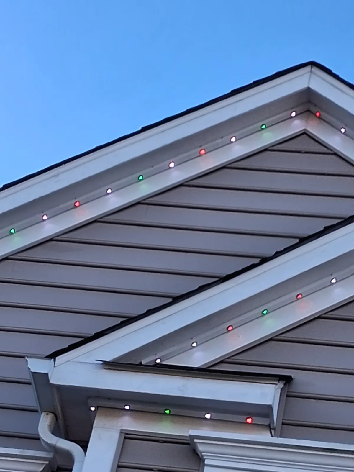 Permanent LED light track closeup during daytime showing clean installation